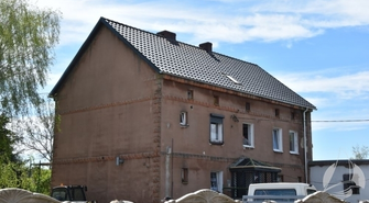 Nowy dach na budynku komunalnym